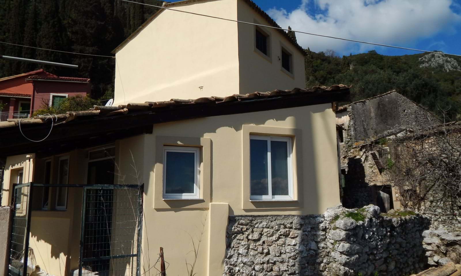 A semi-detached village house with lovely views at the upper part of Ano Korakiana.