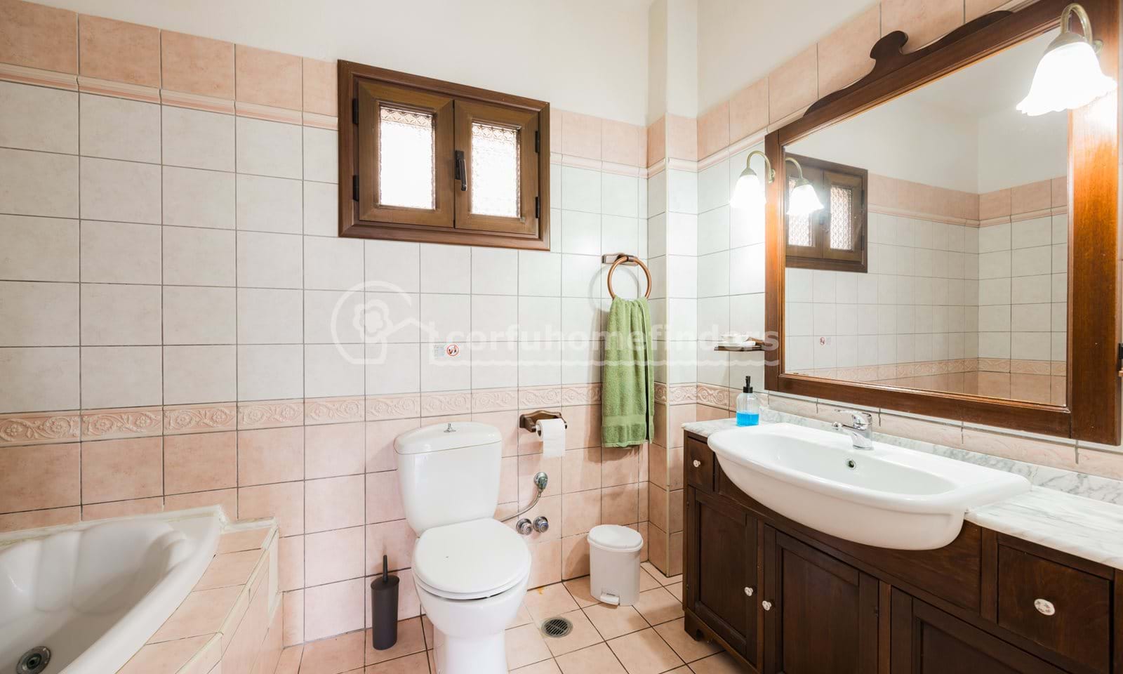 Listing photograph 10 of 20 of the house in Kassiopi, published by Corfu Home Finders.