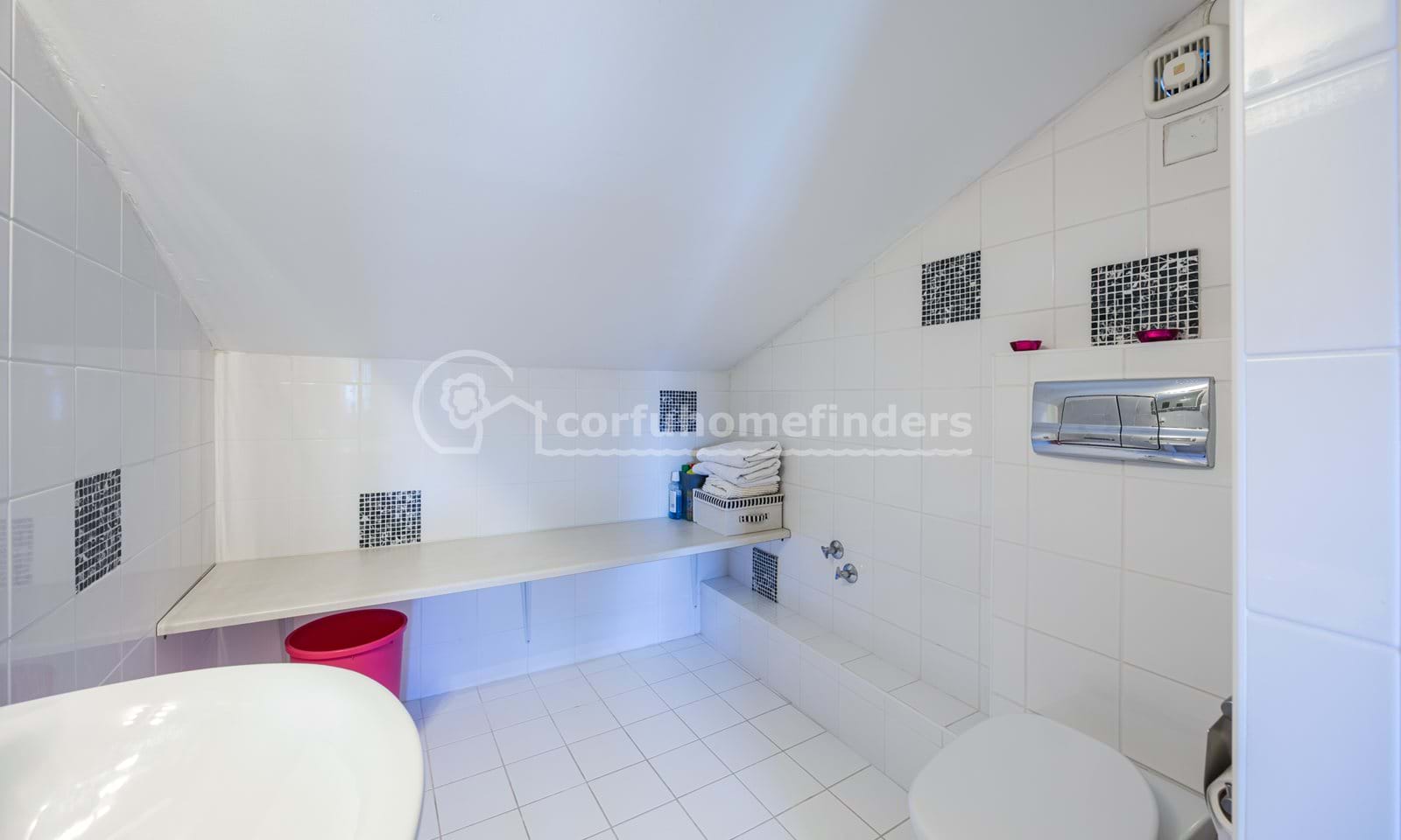 Listing photograph 22 of 29 of the house in Perama, published by Corfu Home Finders.