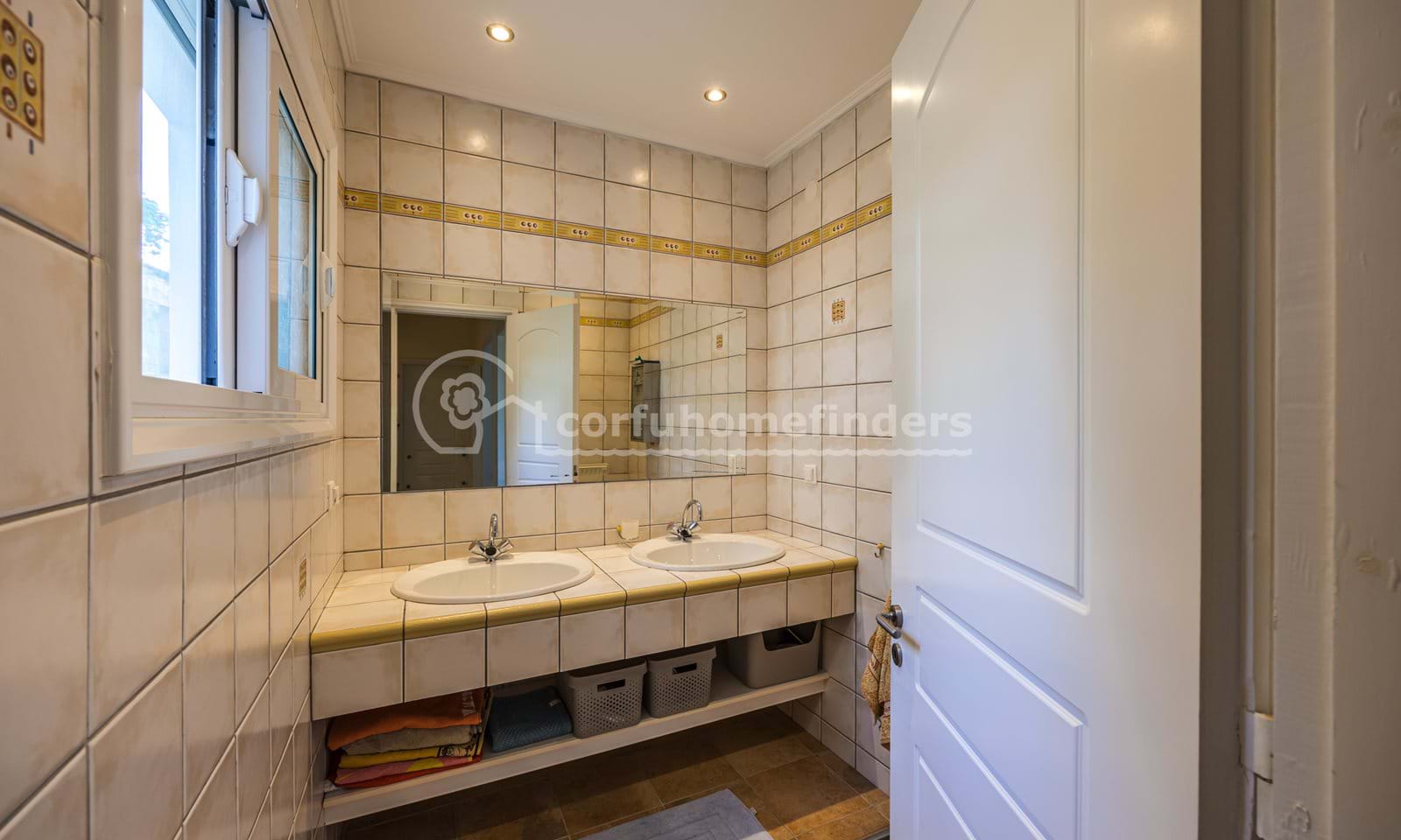Listing photograph 21 of 29 of the house in Perama, published by Corfu Home Finders.