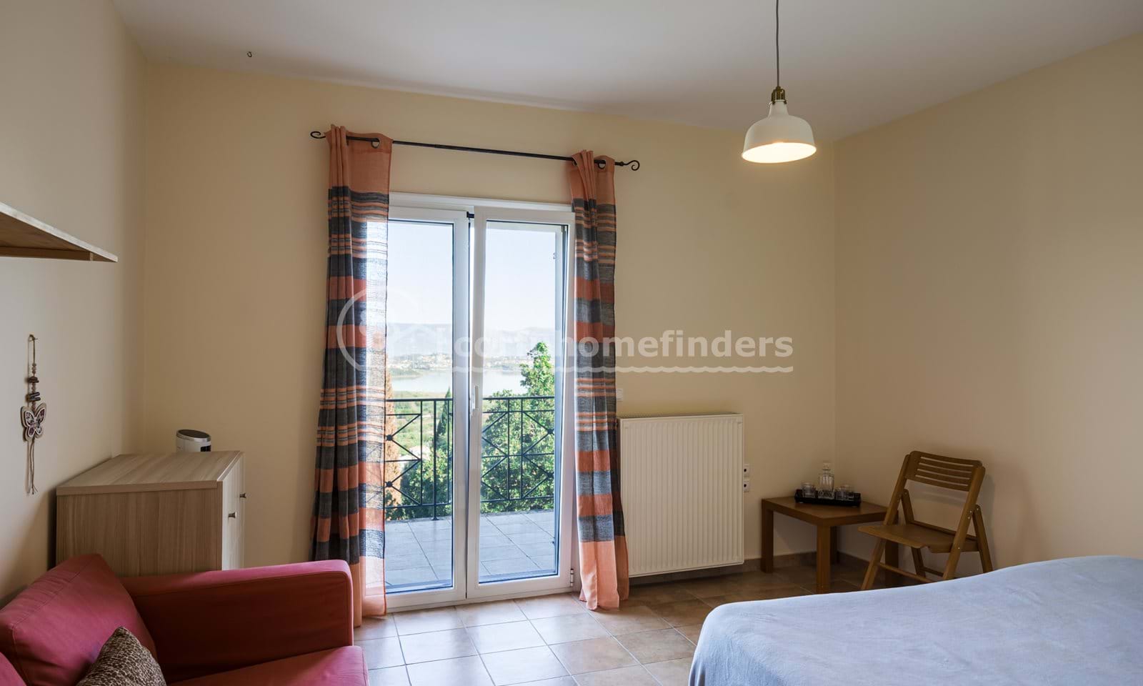 Listing photograph 19 of 29 of the house in Perama, published by Corfu Home Finders.