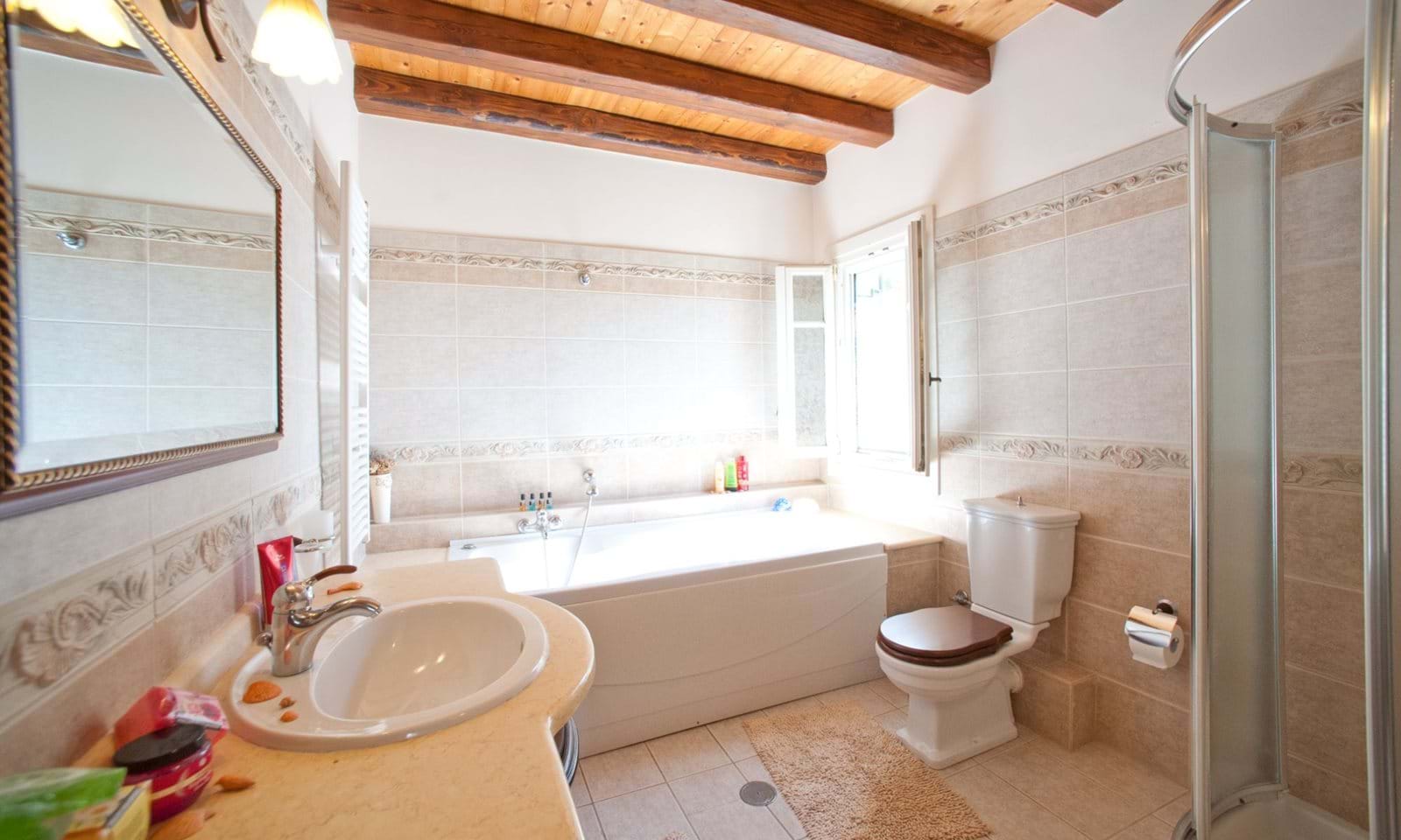 Listing photograph 3 of 17 of the house in Kassiopi, published by Corfu Home Finders.