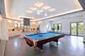 Pool table and kitchen