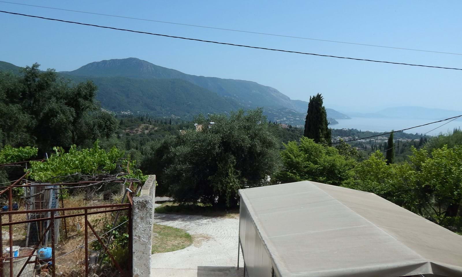 Listing photograph 2 of 17 of the house in Ano Korakiana, published by Corfu Home Finders.