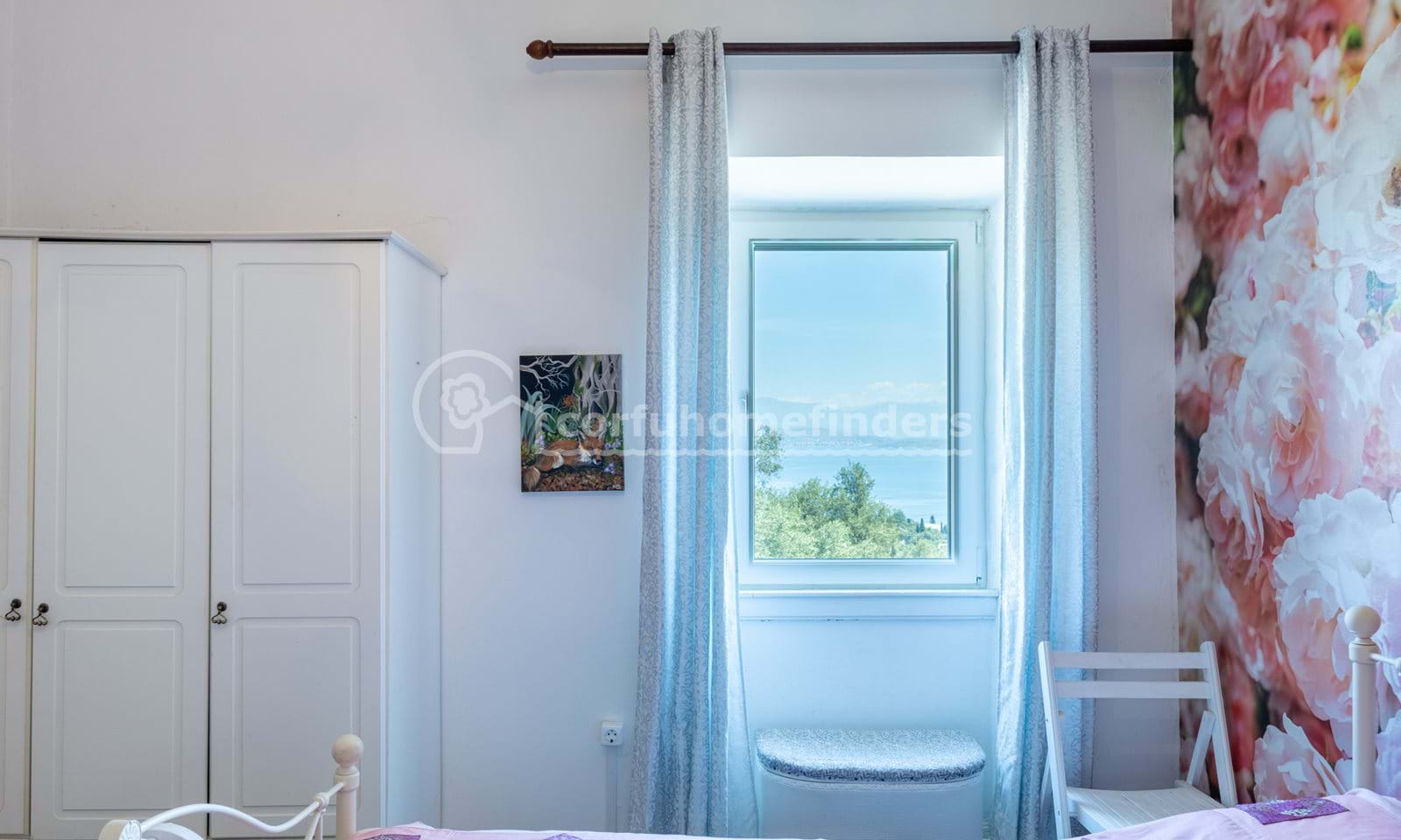 Listing photograph 13 of 18 of the house in Kassiopi, published by Corfu Home Finders.