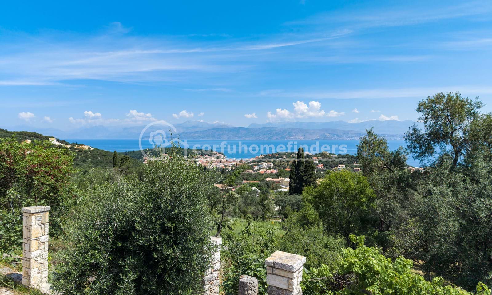 Listing photograph 3 of 18 of the house in Kassiopi, published by Corfu Home Finders.