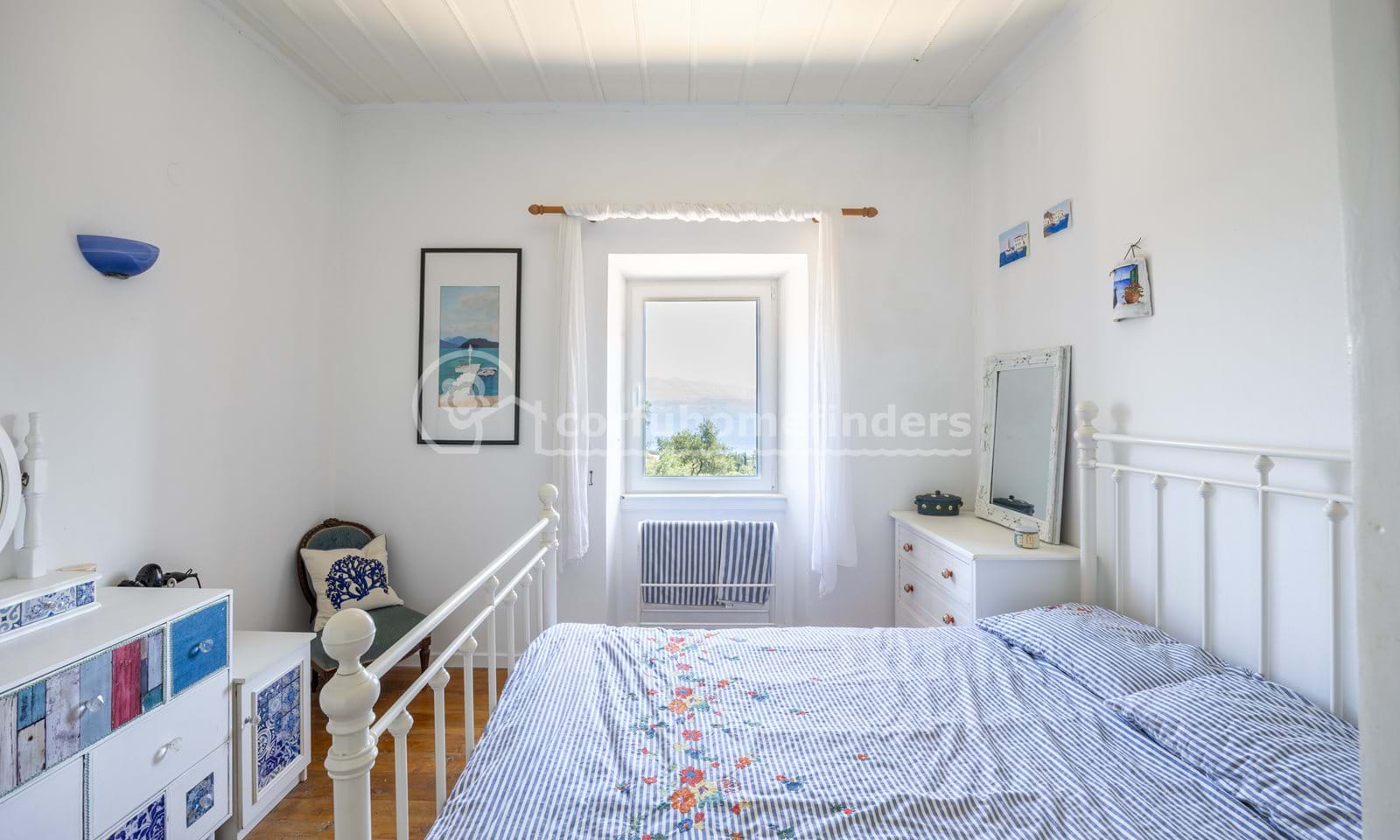 Listing photograph 11 of 18 of the house in Kassiopi, published by Corfu Home Finders.