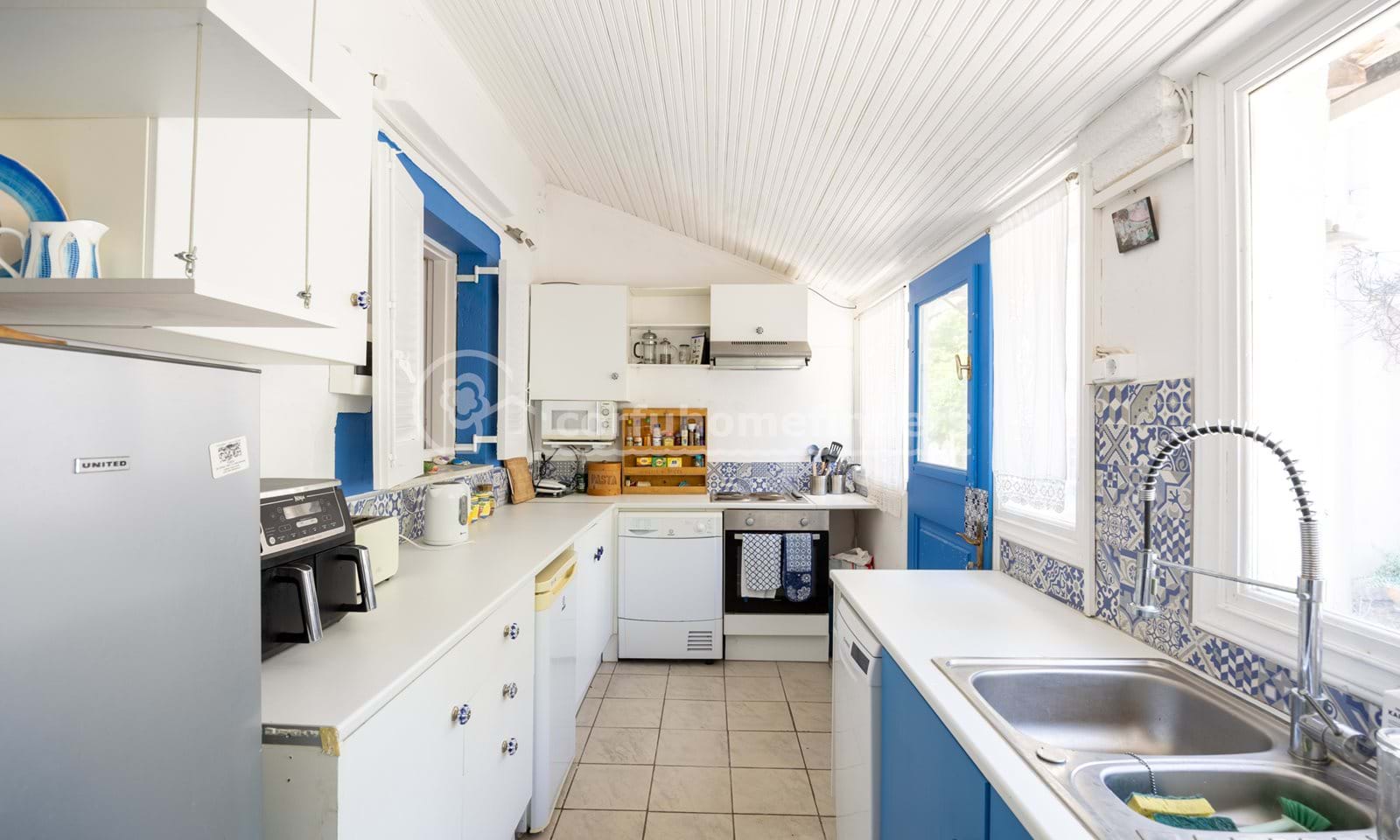 Listing photograph 14 of 18 of the house in Kassiopi, published by Corfu Home Finders.