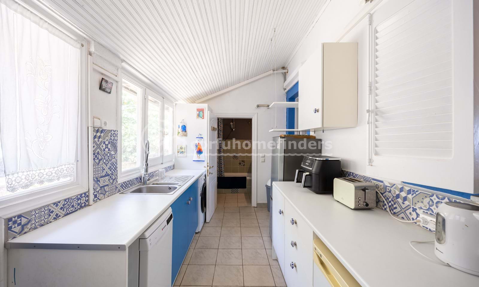 Listing photograph 15 of 18 of the house in Kassiopi, published by Corfu Home Finders.