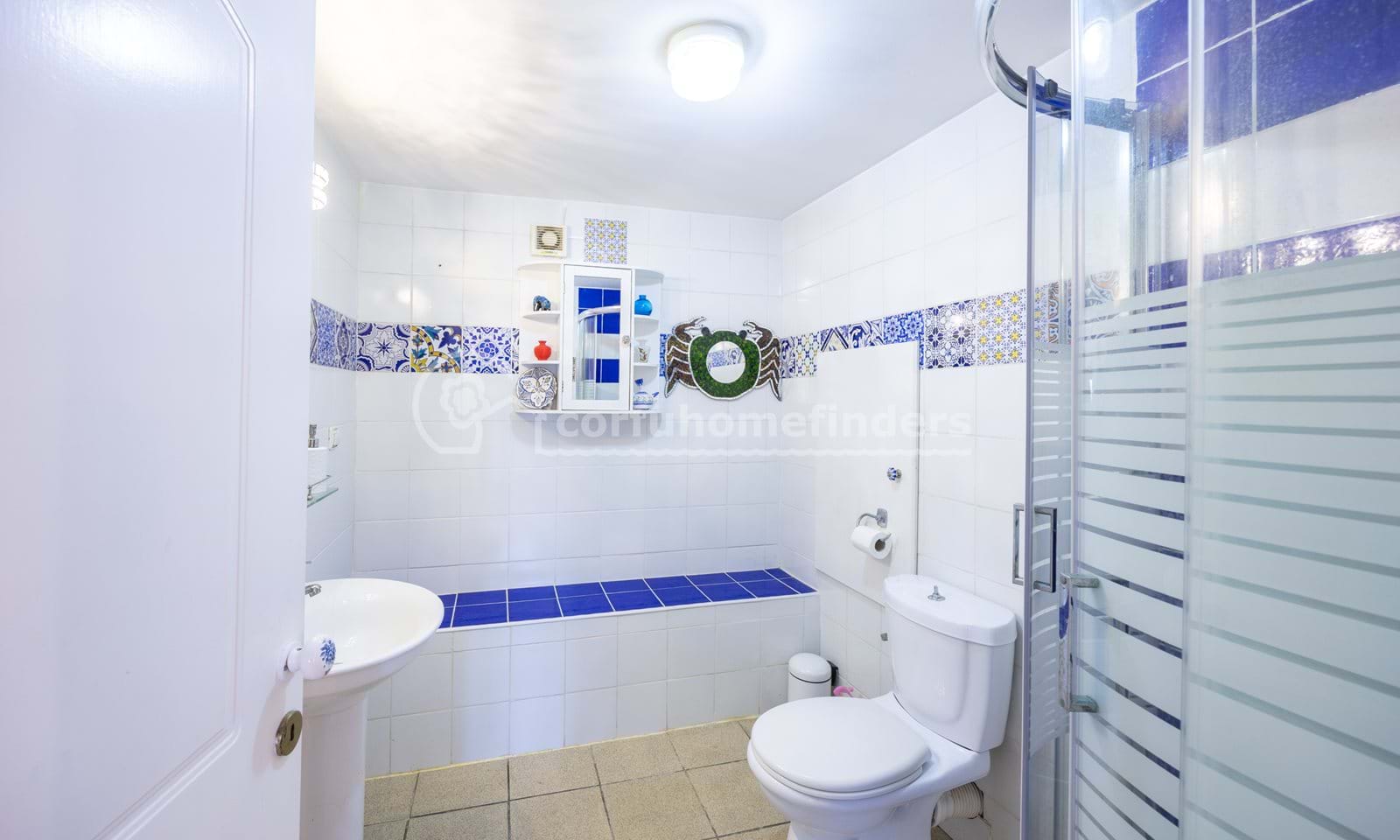 Listing photograph 6 of 18 of the house in Kassiopi, published by Corfu Home Finders.