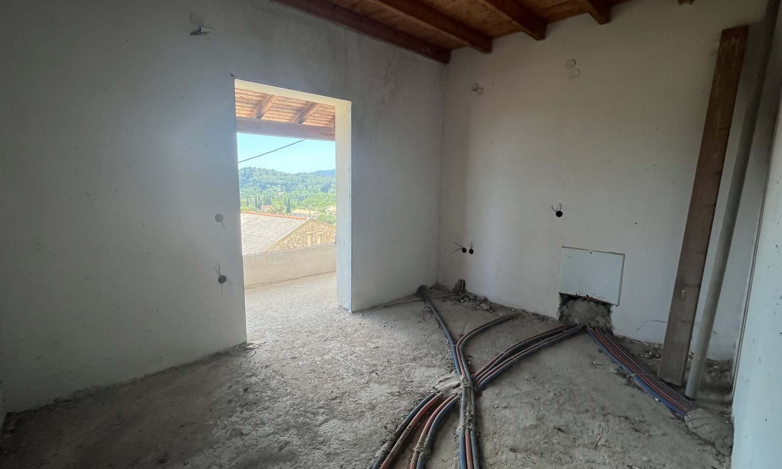 Listing photograph 8 of 14 of the house in Ano Korakiana, published by Corfu Home Finders.