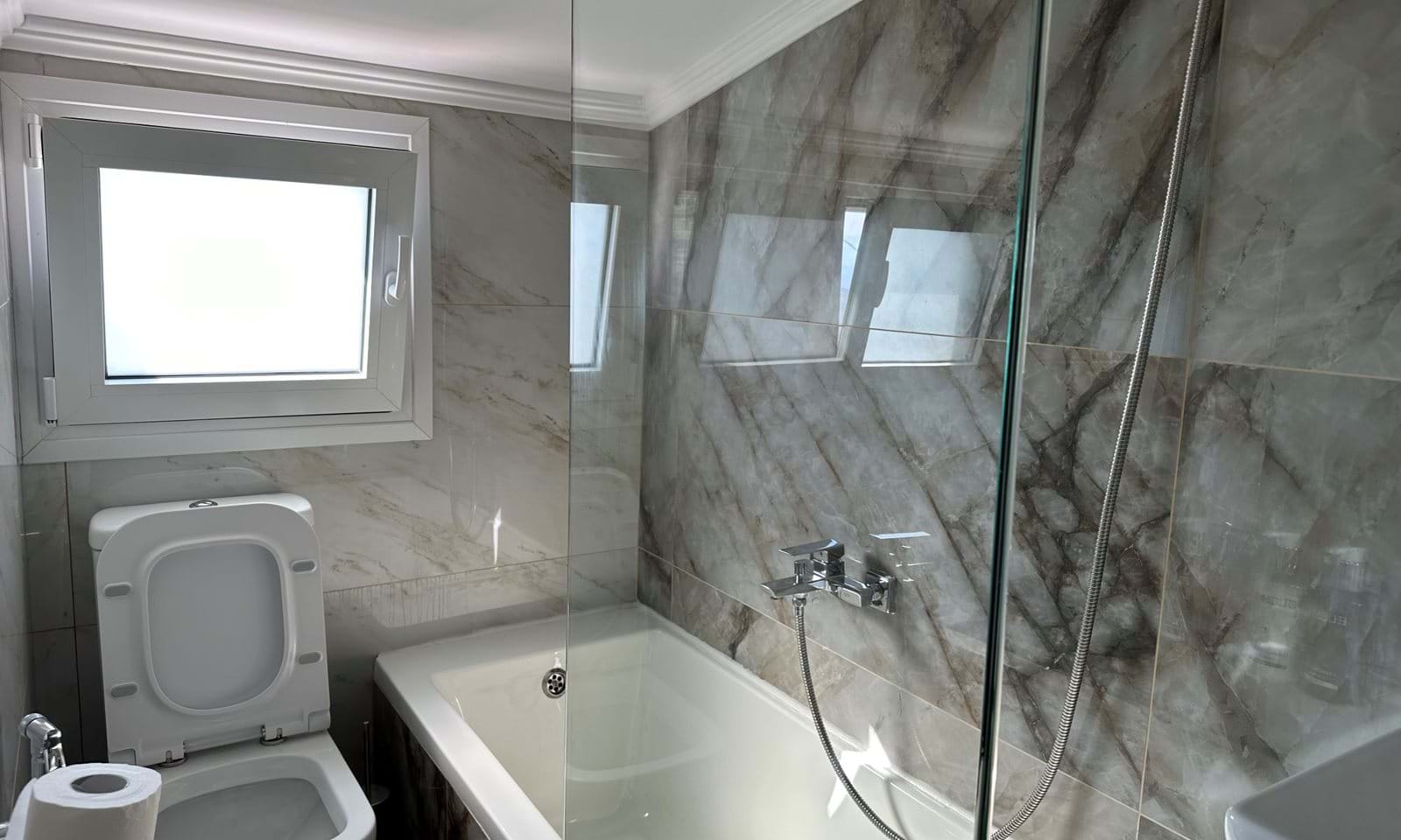 Listing photograph 12 of 34 of the house in Kassiopi, published by Corfu Home Finders.