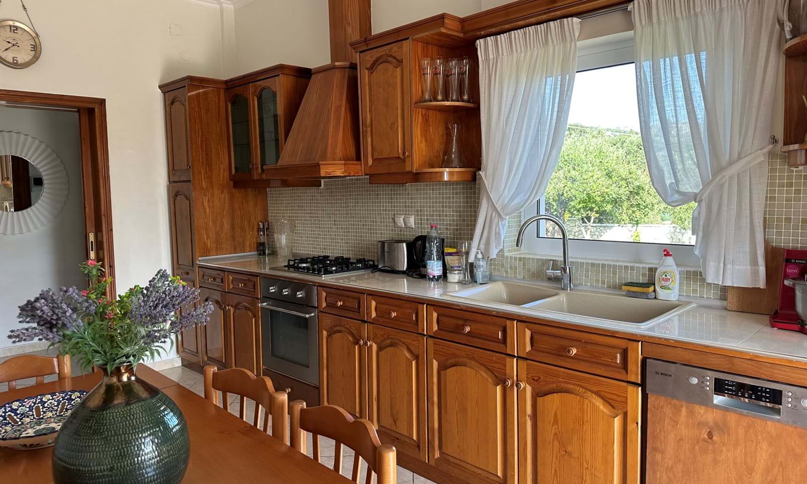 Listing photograph 27 of 34 of the house in Kassiopi, published by Corfu Home Finders.