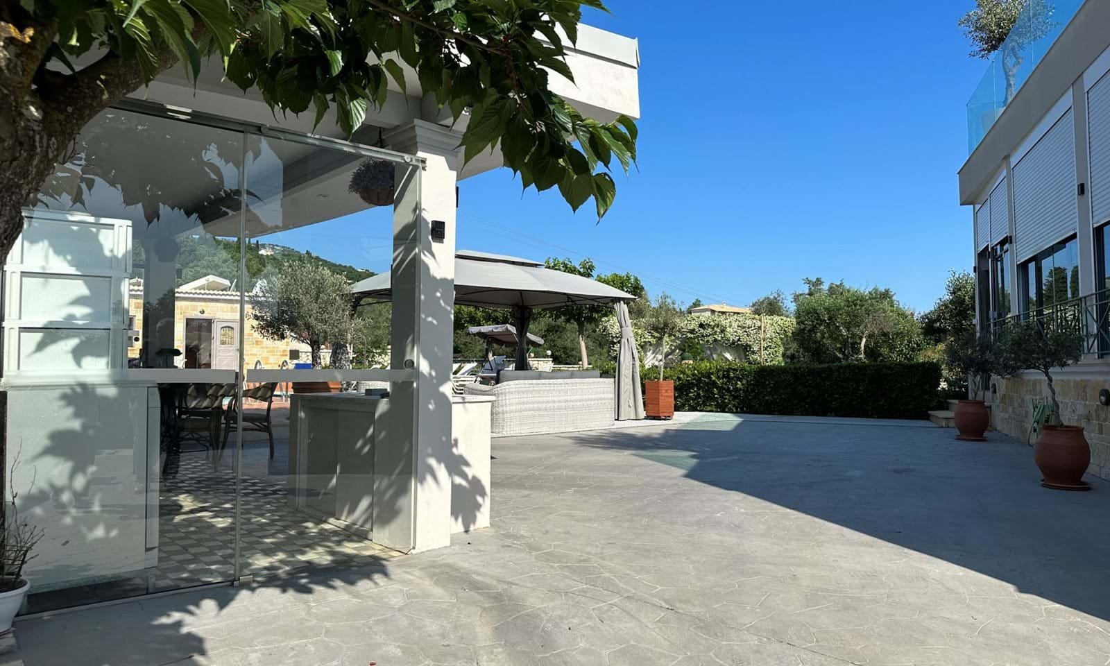 Listing photograph 3 of 34 of the house in Kassiopi, published by Corfu Home Finders.