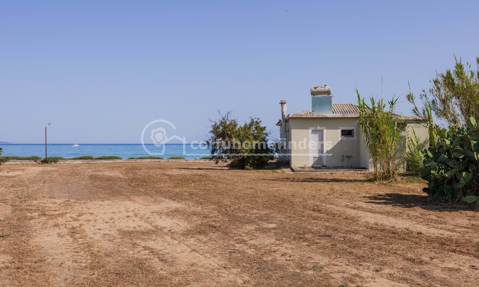 Listing photograph 2 of 13 of the house in Agios Ioannis, published by Corfu Home Finders.