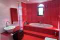 Red bathroom upstairs