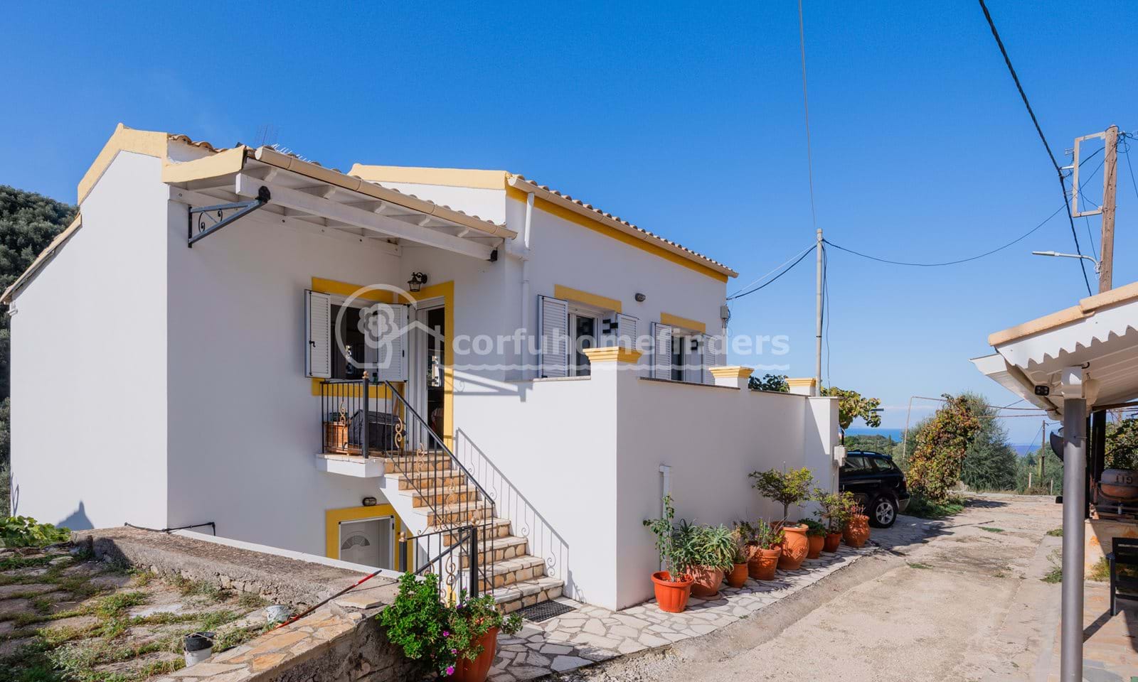 Listing photograph 1 of 24 of the house in Agios Martinos, published by Corfu Home Finders.