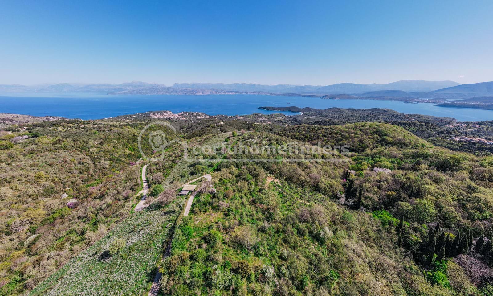 Listing photograph 1 of 5 of the land in Kassiopi, published by Corfu Home Finders.