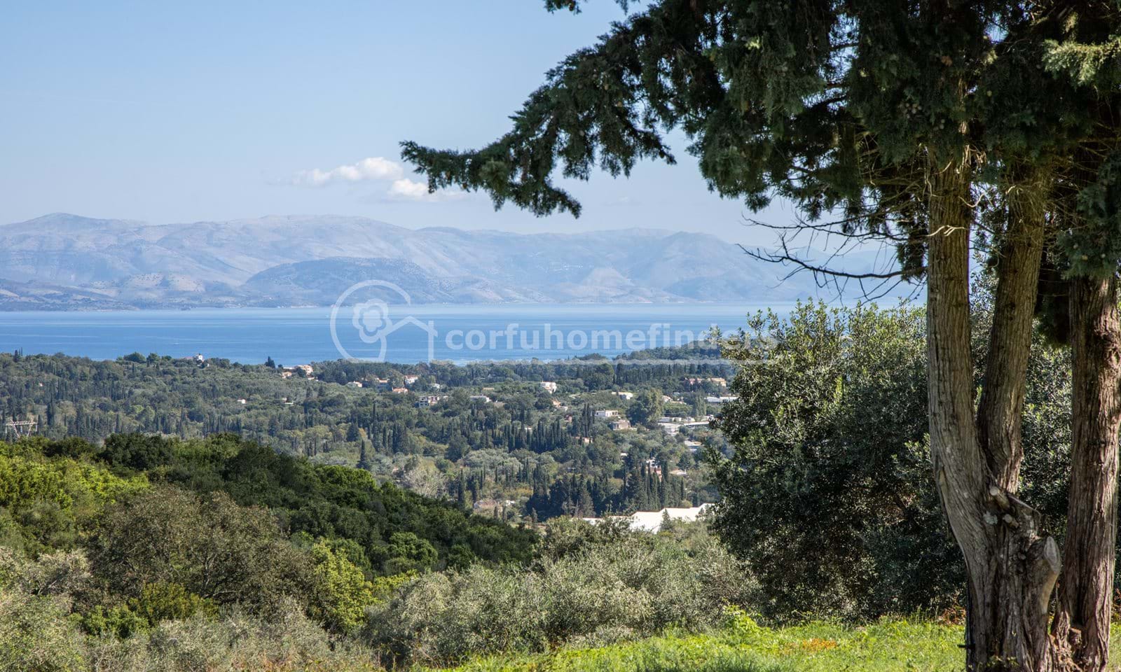 Listing photograph 1 of 8 of the land in Poulades, published by Corfu Home Finders.