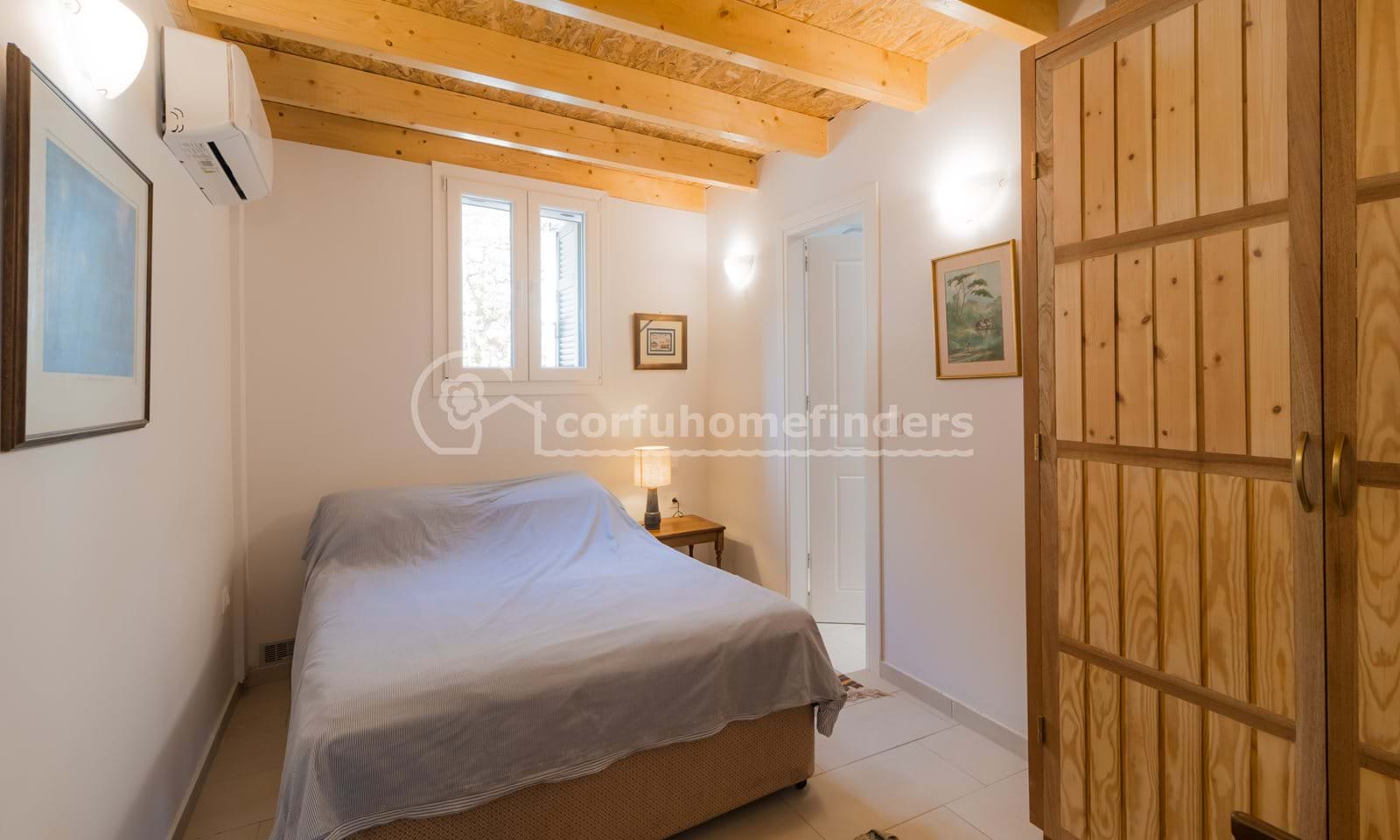 Listing photograph 17 of 19 of the house in Kouramades, published by Corfu Home Finders.