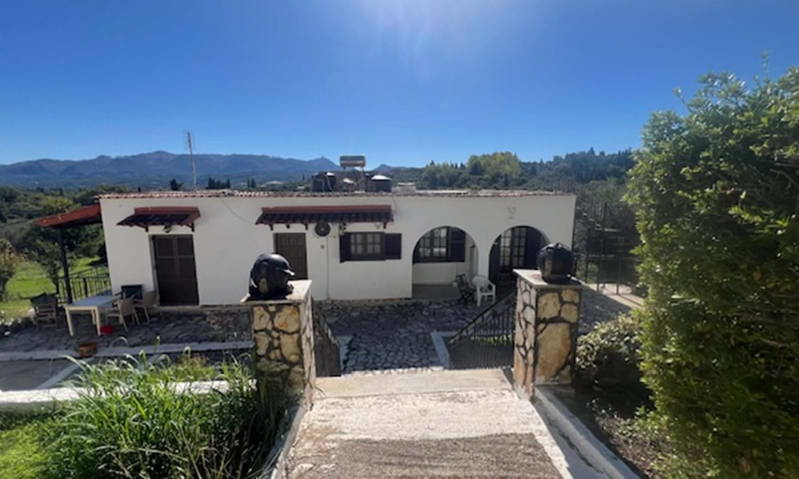 Listing photograph 1 of 20 of the apartment in Agnos, published by Corfu Home Finders.