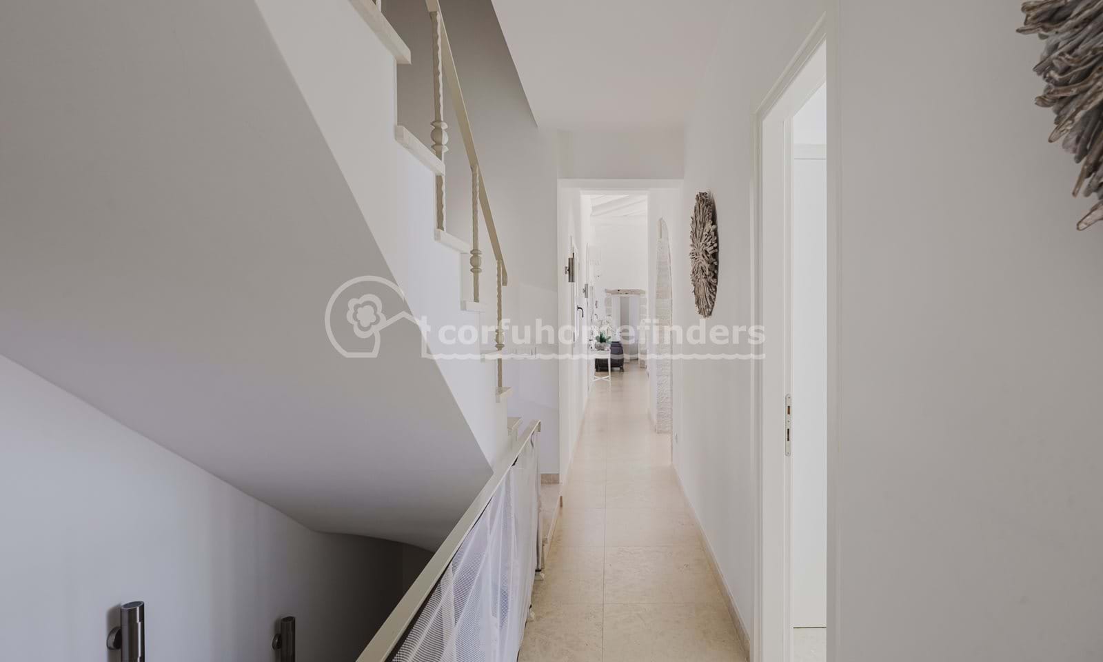 Listing photograph 15 of 31 of the house in Kassiopi, published by Corfu Home Finders.