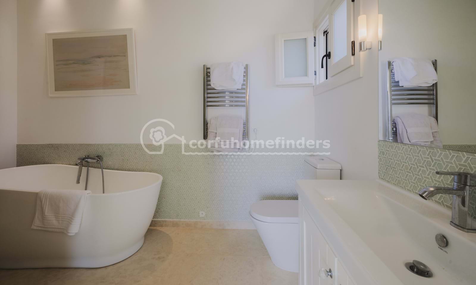 Listing photograph 25 of 31 of the house in Kassiopi, published by Corfu Home Finders.