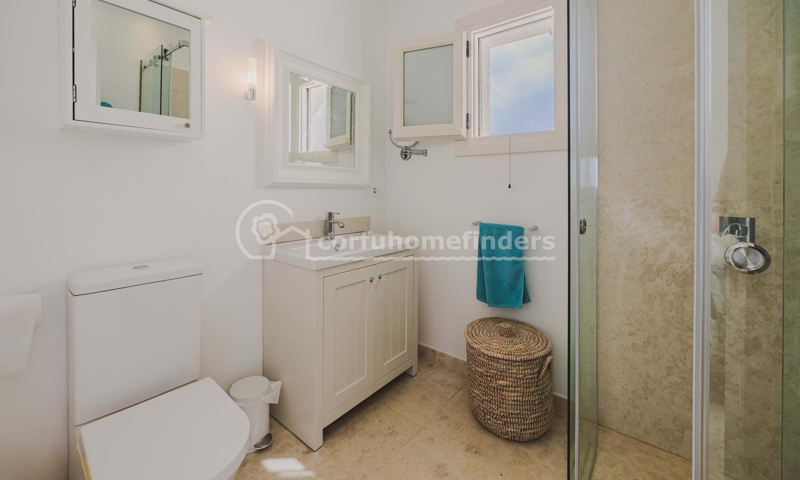 Listing photograph 19 of 31 of the house in Kassiopi, published by Corfu Home Finders.