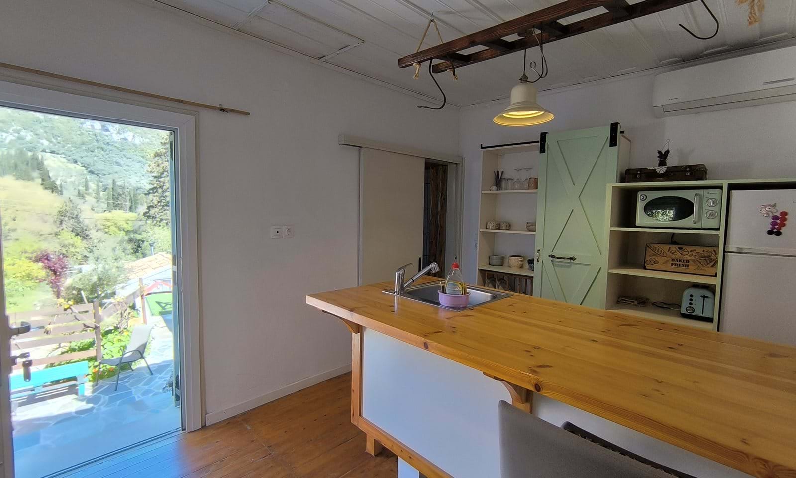 Listing photograph 5 of 12 of the house in Doukades, published by Corfu Home Finders.