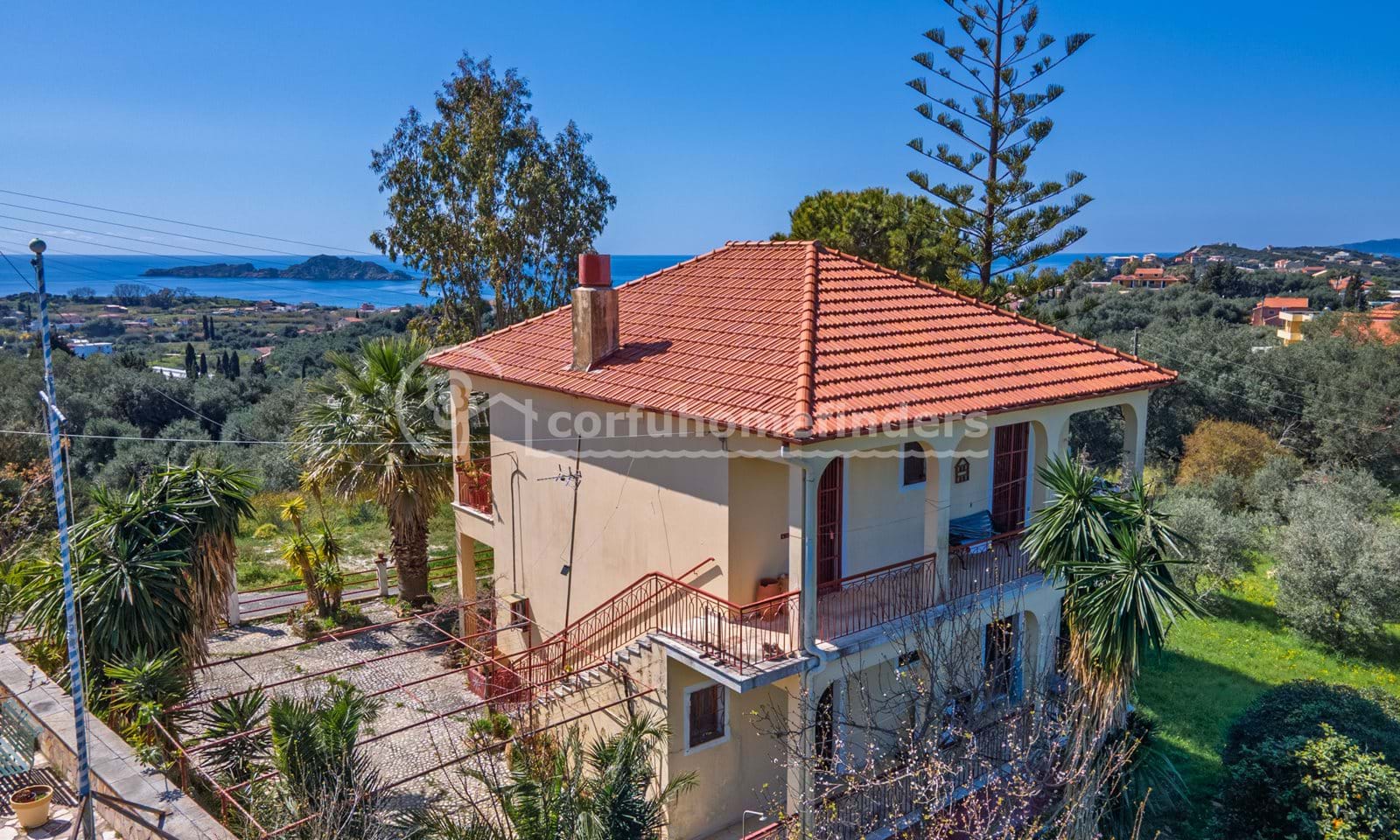 Listing photograph 1 of 15 of the house in Arilas, published by Corfu Home Finders.