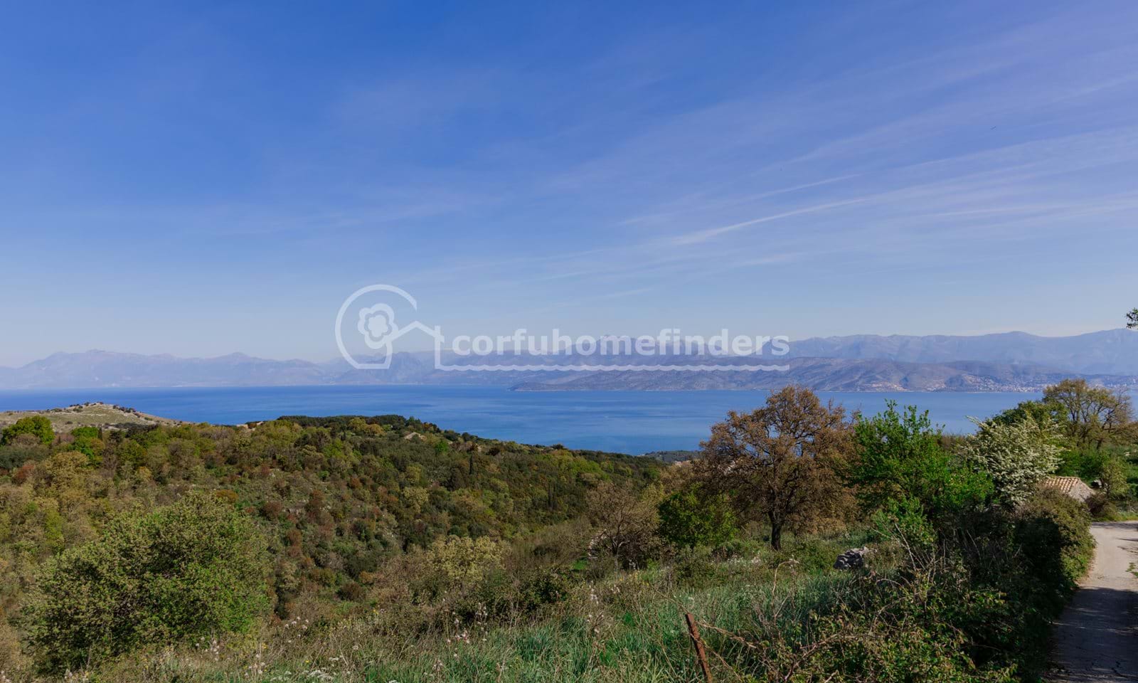 Listing photograph 2 of 10 of the land in Kassiopi, published by Corfu Home Finders.