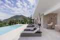 Pool loungers and villa