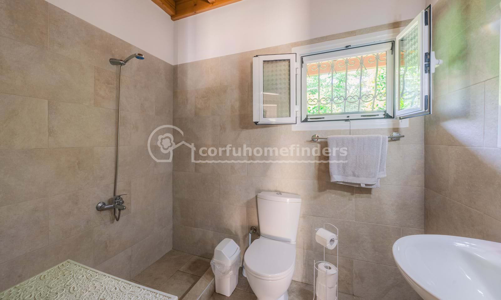 Listing photograph 12 of 19 of the house in Astrakeri, published by Corfu Home Finders.