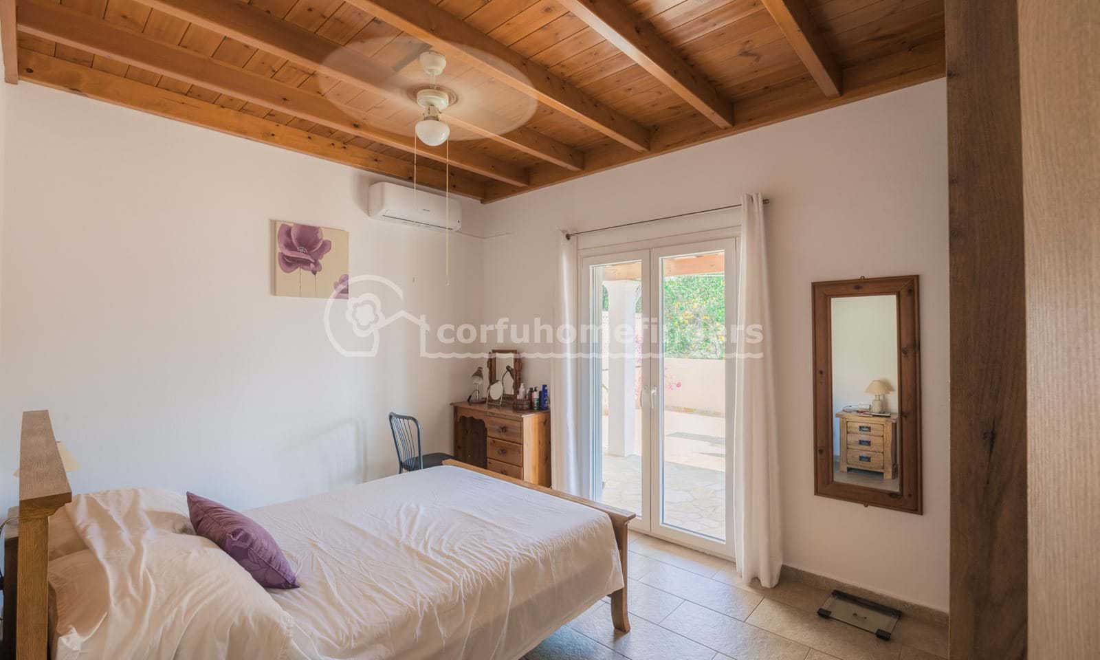 Listing photograph 11 of 19 of the house in Astrakeri, published by Corfu Home Finders.
