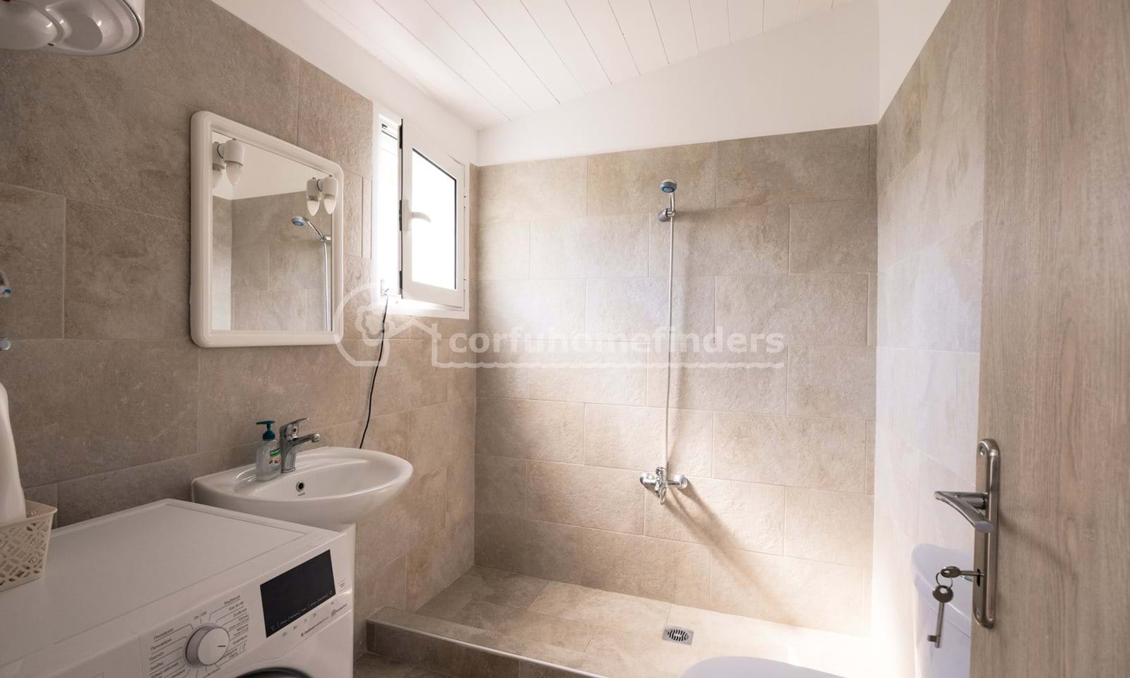 Listing photograph 16 of 19 of the house in Astrakeri, published by Corfu Home Finders.