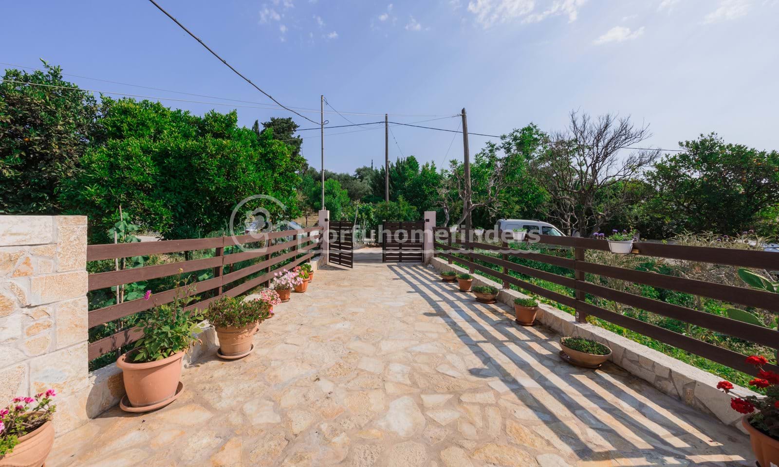 Listing photograph 3 of 19 of the house in Astrakeri, published by Corfu Home Finders.