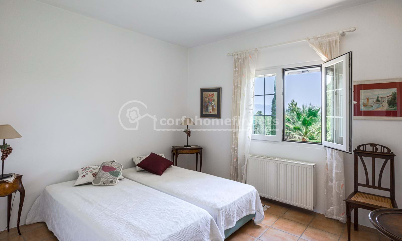 Listing photograph 12 of 28 of the house in Poulades, published by Corfu Home Finders.
