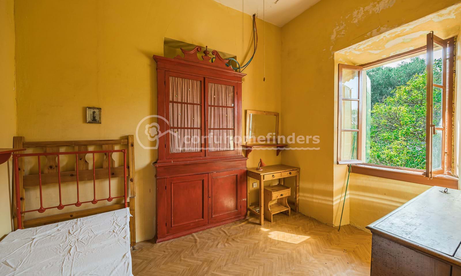 Listing photograph 12 of 18 of the house in Agii Douli, published by Corfu Home Finders.