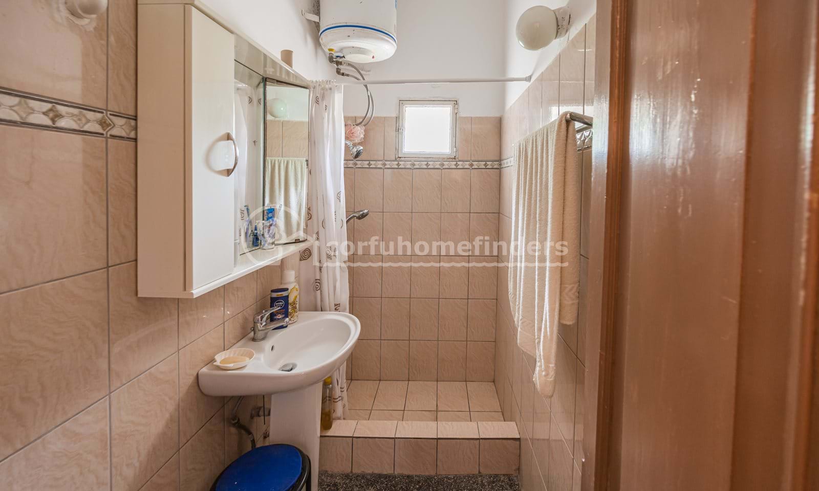 Listing photograph 10 of 18 of the house in Agii Douli, published by Corfu Home Finders.