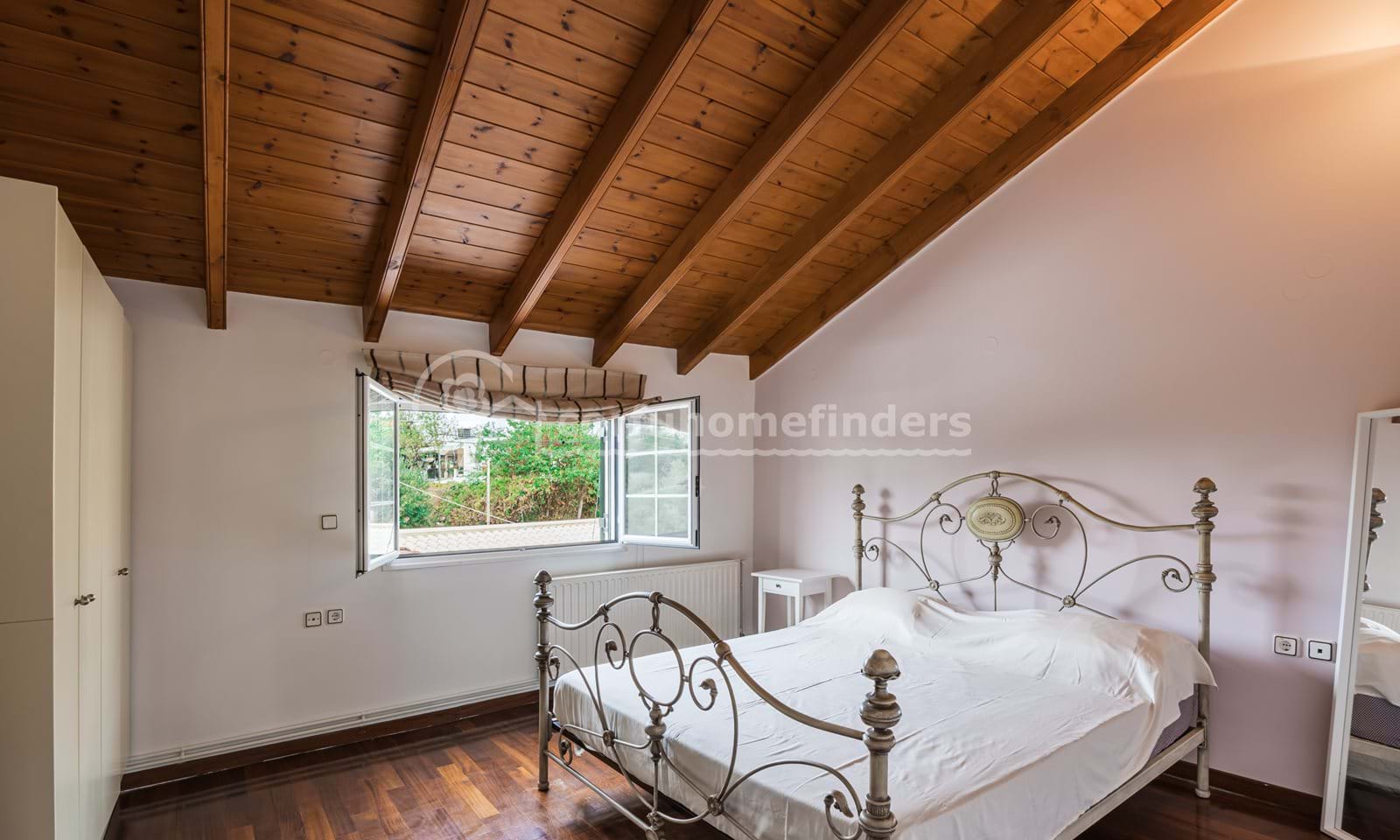 Listing photograph 21 of 25 of the house in Karousades, published by Corfu Home Finders.