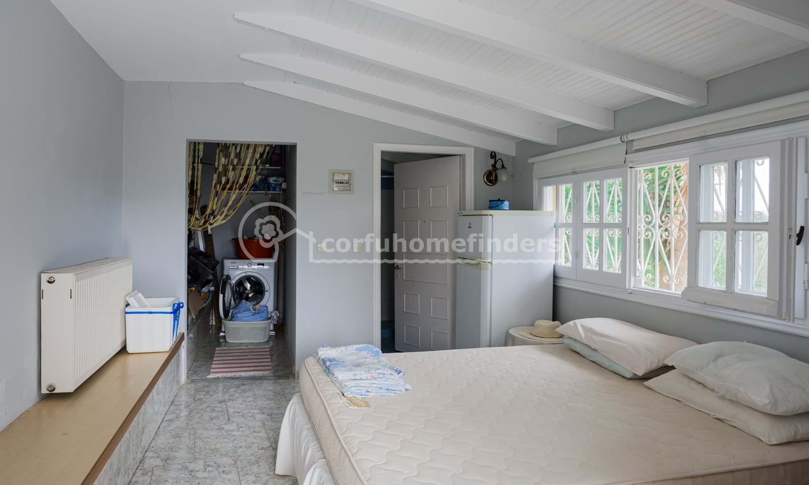Listing photograph 24 of 25 of the house in Karousades, published by Corfu Home Finders.