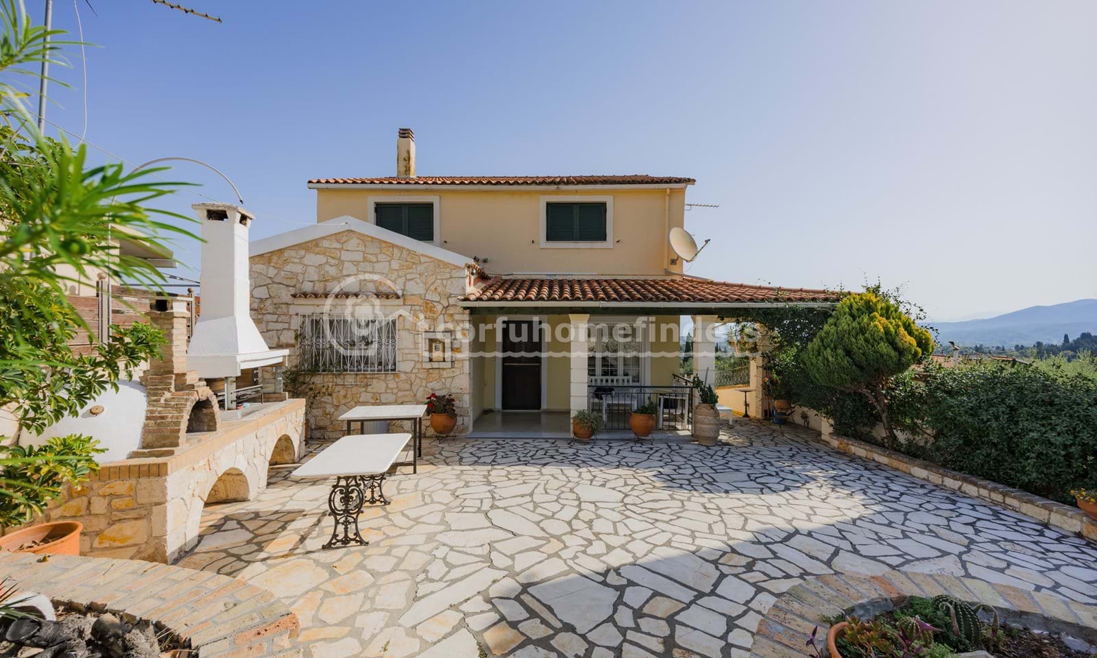 Listing photograph 1 of 25 of the house in Karousades, published by Corfu Home Finders.