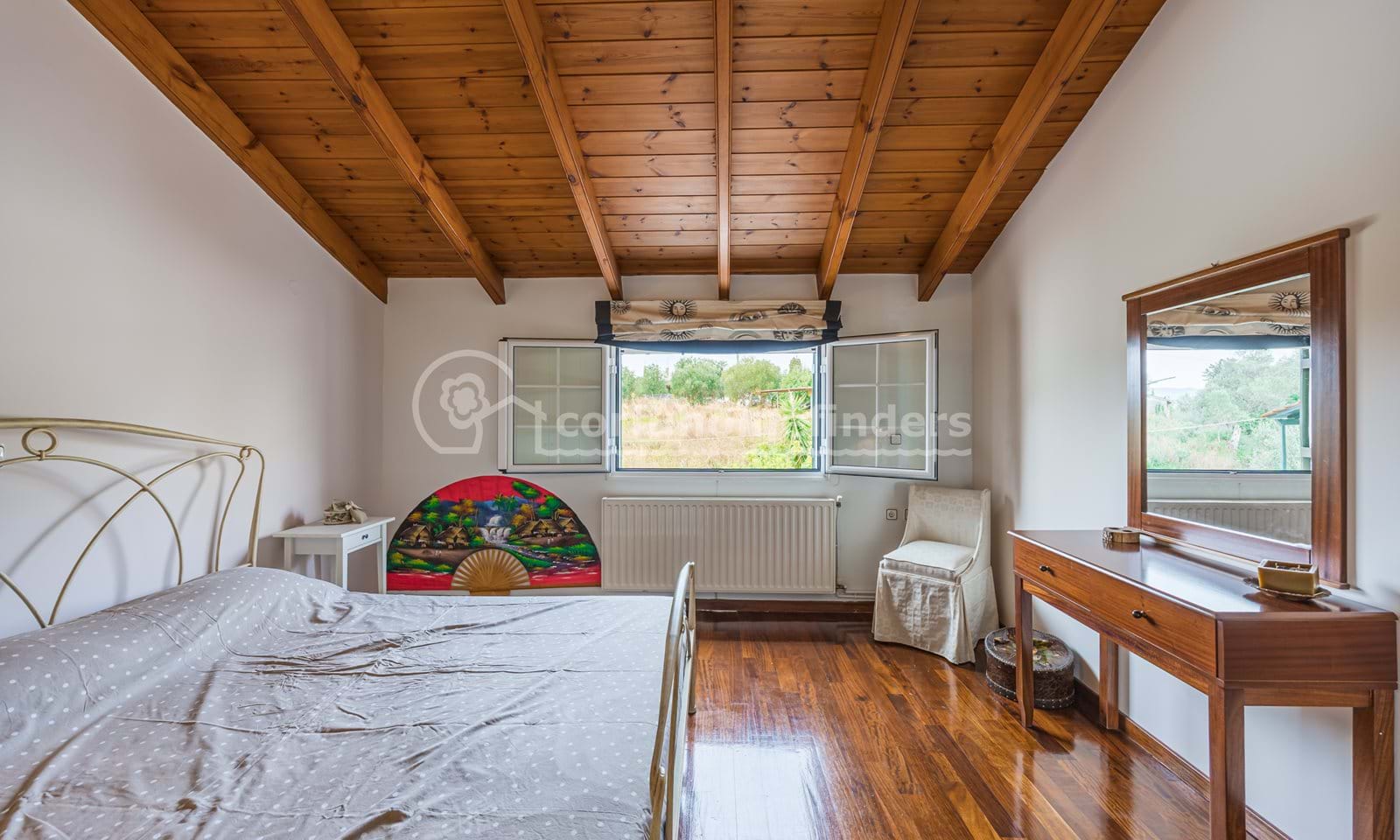 Listing photograph 22 of 25 of the house in Karousades, published by Corfu Home Finders.