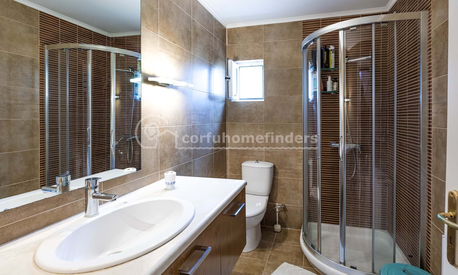 Listing photograph 13 of 25 of the house in Karousades, published by Corfu Home Finders.
