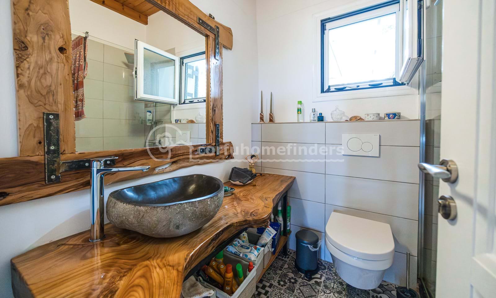 Listing photograph 20 of 23 of the house in Karousades, published by Corfu Home Finders.