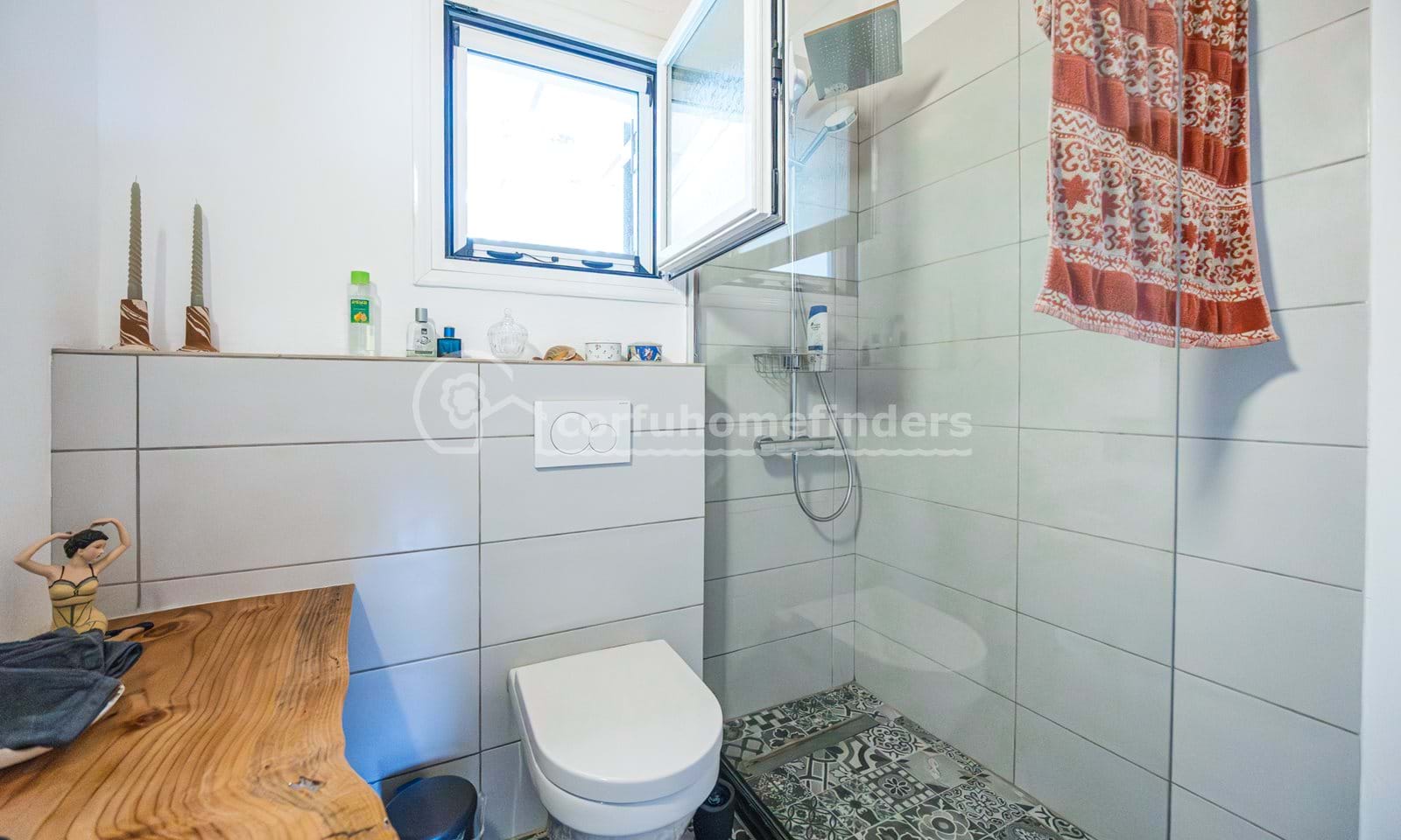 Listing photograph 21 of 23 of the house in Karousades, published by Corfu Home Finders.