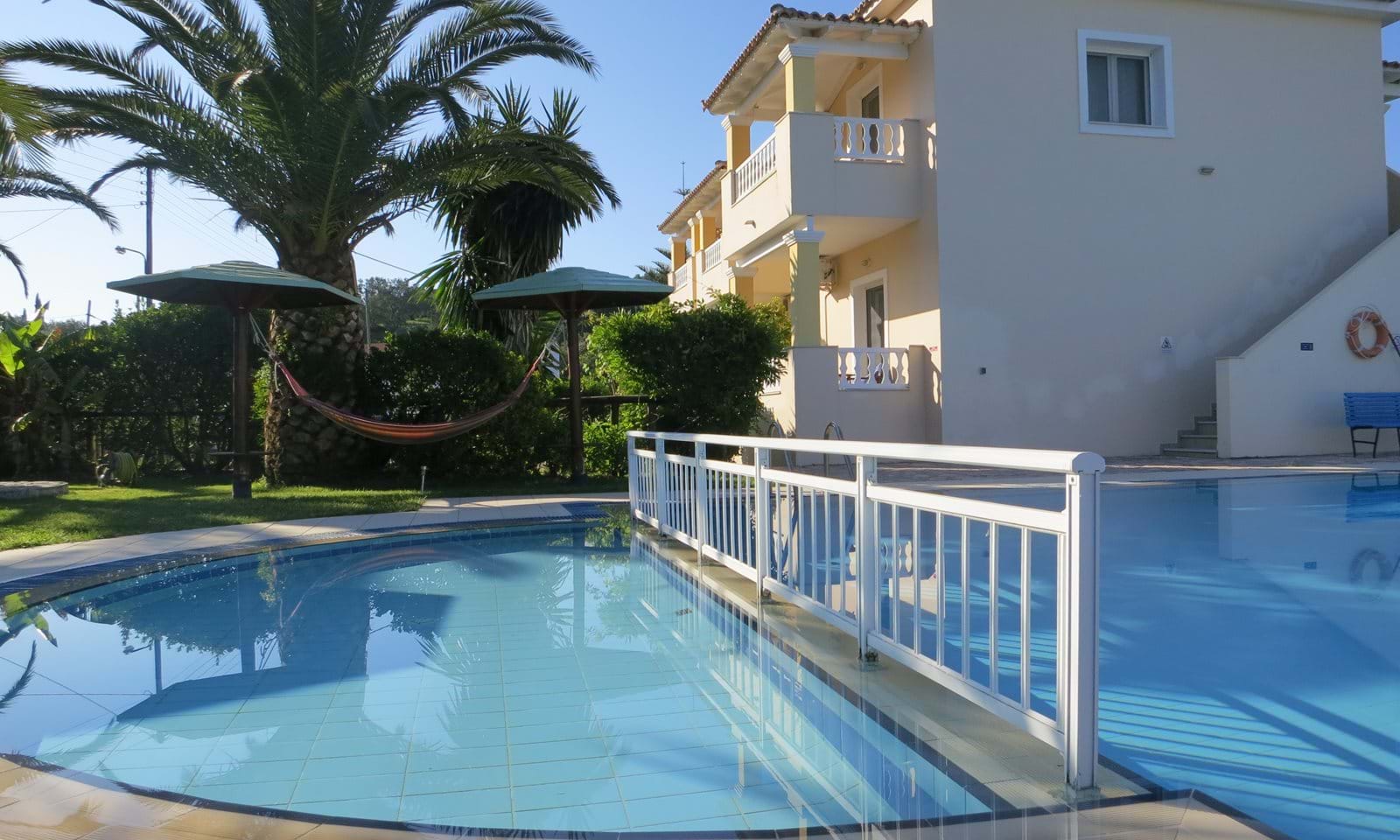 Listing photograph 1 of 18 of the house in Arilas, published by Corfu Home Finders.