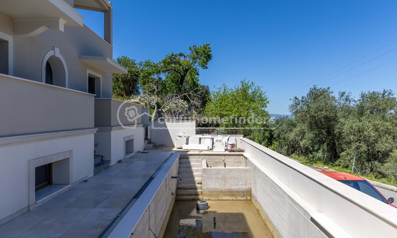 Listing photograph 3 of 19 of the house in Agii Deka, published by Corfu Home Finders.