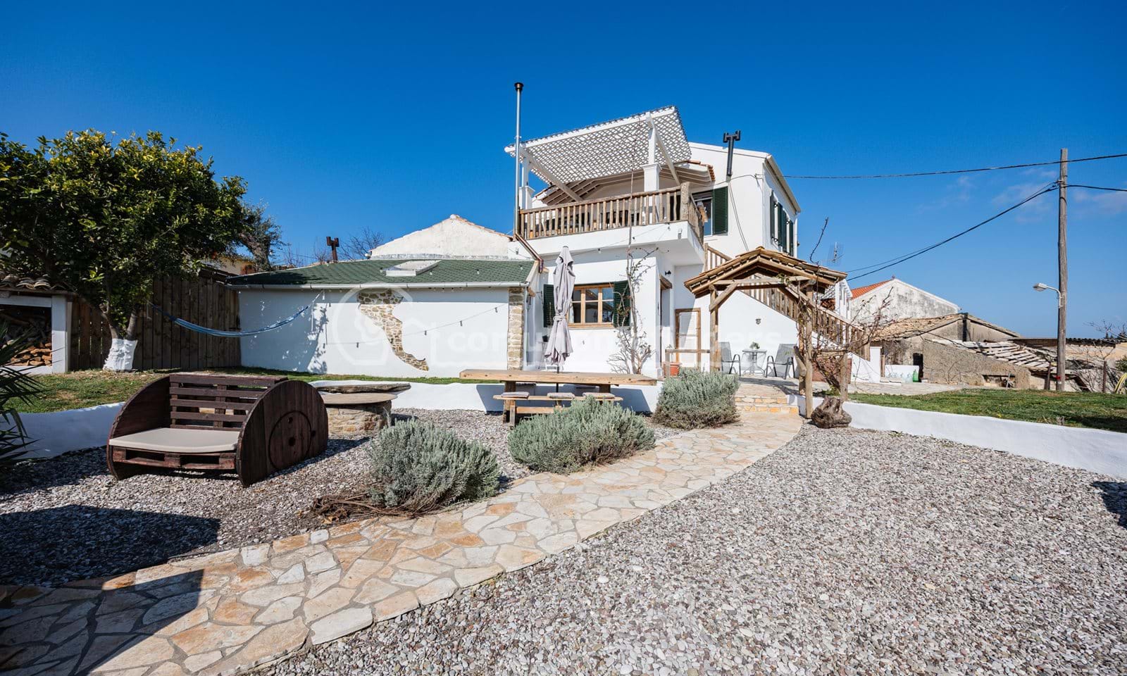 Listing photograph 3 of 23 of the house in Rachtades, published by Corfu Home Finders.