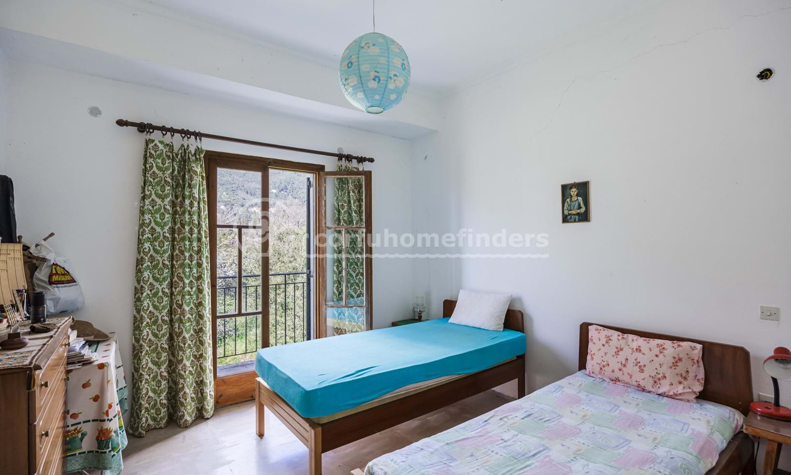 Listing photograph 9 of 18 of the house in Ano Korakiana, published by Corfu Home Finders.